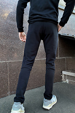 Черные спортивные штаны узкие из трикотажа GEN 8000268 фото №2