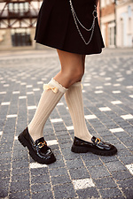 Beige Kniestrümpfe für Kinder mit Schleife. M-SOCKS 2040281 Foto №5