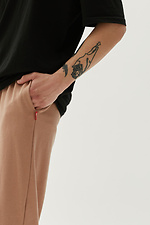 Трикотажные спортивные брюки бежевого цвета с манжетами GEN 8000325 фото №3