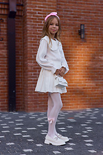 Durchbrochene rosa Kinderstrumpfhose mit Schleife M-SOCKS 2040342 Foto №2