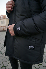 Warm black parka with a long cut for the winter with a hood and knitted cuffs Custom Wear 8025342 photo №2