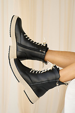 Damen-Winterstiefel aus Leder in Schwarz 2505346 Foto №8