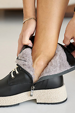 Damen-Winterstiefel aus Leder in Schwarz 2505346 Foto №10