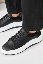 Damen-Sneakers aus schwarzem Leder fr Frhling und Herbst 2505355 Foto №1