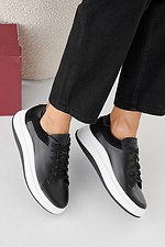 Damen-Sneakers aus schwarzem Leder fr Frhling und Herbst  2505355 Foto №3