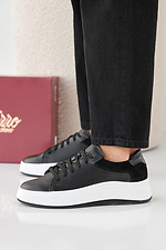 Damen-Sneakers aus schwarzem Leder fr Frhling und Herbst  2505355 Foto №5