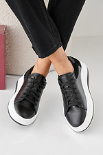 Damen-Sneakers aus schwarzem Leder fr Frhling und Herbst 2505355 Foto №10