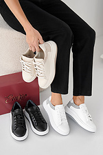 Damen-Sneakers aus schwarzem Leder fr Frhling und Herbst  2505355 Foto №11