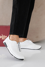 Women's spring-autumn white-black leather sneakers  2505363 photo №1