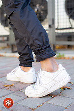Warme Jogginghose mit Fleece in Schwarz Without 8048365 Foto №6