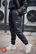 Warme Jogginghose mit Fleece in Schwarz Without 8048366 Foto №1