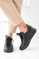 Damen-Sneakers aus schwarzem Leder fr Frhling und Herbst 2505385 Foto №6