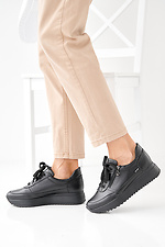 Damen-Sneakers aus schwarzem Leder fr Frhling und Herbst 2505385 Foto №7
