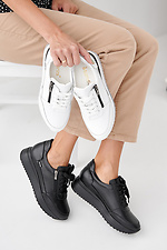 Damen-Sneakers aus schwarzem Leder fr Frhling und Herbst 2505385 Foto №8