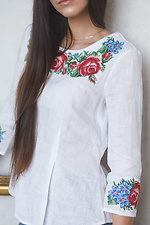 Biała lniana haftowana bluzka z baskinką i krótkimi rękawami Cornett-VOL 2012401 zdjęcie №2