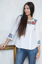Biała lniana haftowana bluzka z baskinką i krótkimi rękawami Cornett-VOL 2012401 zdjęcie №3