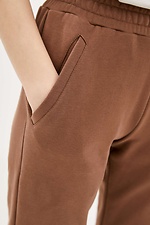 Бавовняні штани FIDAN коричневого кольору звуженого крою Garne 3037403 фото №4