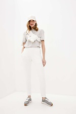 Бавовняні штани FIDAN білого кольору звуженого крою Garne 3037405 фото №2