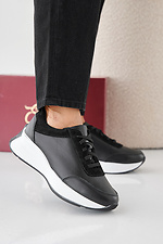 Damen-Sneakers aus schwarzem Leder fr Frhling und Herbst 2505416 Foto №4