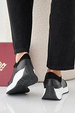 Damen-Sneakers aus schwarzem Leder fr Frhling und Herbst 2505416 Foto №6