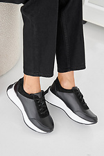 Damen-Sneakers aus schwarzem Leder fr Frhling und Herbst 2505416 Foto №8
