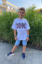 Weißes, übergroßes Kinder-T-Shirt mit „Vyshyvanka“-Aufdruck Garne 9000423 Foto №4