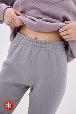 Knitted sweatpants PART on fleece with cuffs Garne 3037436 photo №4