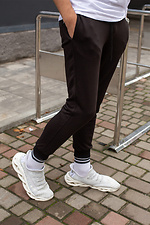 Хлопковые спортивные штаны черного цвета с манжетами Without 8048436 фото №2
