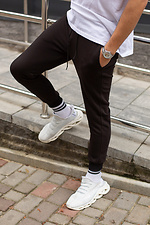 Хлопковые спортивные штаны черного цвета с манжетами Without 8048436 фото №4