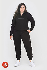 Isolierte Hose mit Seitentaschen in Schwarz Garne 3041442 Foto №2