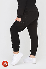 Isolierte Hose mit Seitentaschen in Schwarz Garne 3041442 Foto №3