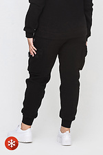 Isolierte Hose mit Seitentaschen in Schwarz Garne 3041442 Foto №4