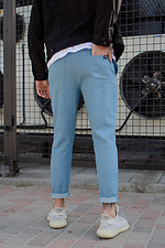 Широкие джинсовые штаны с манжетами и шнурками Without 8048466 фото №4