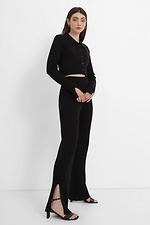 Short black ribbed knitted cardigan with slits on the sleeves.  4038469 photo №2