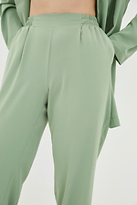 Высокие широкие брюки из костюмки оливкового цвета Garne 3039485 фото №4