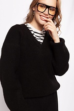 Der Pullover ist schwarz Sewel 4038488 Foto №3