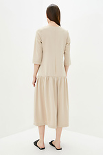 Довга сукня оверсайз бежевого кольору з відрізною спідницею Garne 3039496 фото №3
