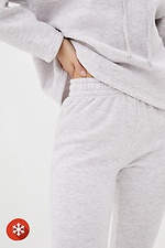 Warm POCKET sweatpants in melange jersey with fleece Garne 3037506 photo №4