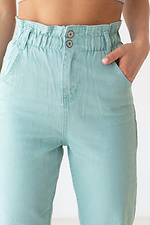 Letnie wysokie jeansy w miętowym kolorze z falbaną w pasie  4014523 zdjęcie №5