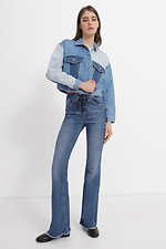 Krótka wiosenna kurtka jeansowa zapinana na guziki  4014553 zdjęcie №2