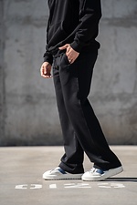Schwarze Herren-Sporthose mit geradem Bein und lockerer Passform im Oversized-Schnitt. Teamv 8034570 Foto №3