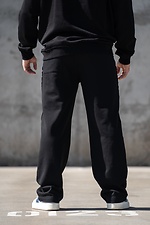 Schwarze Herren-Sporthose mit geradem Bein und lockerer Passform im Oversized-Schnitt. Teamv 8034570 Foto №4