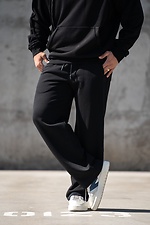 Schwarze Herren-Sporthose mit geradem Bein und lockerer Passform im Oversized-Schnitt. Teamv 8034570 Foto №5