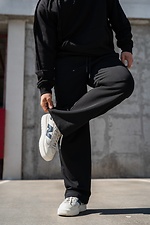 Schwarze Herren-Sporthose mit geradem Bein und lockerer Passform im Oversized-Schnitt. Teamv 8034570 Foto №6
