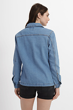 Тонкая женская джинсовая куртка с затяжкой по низу  4014574 фото №3