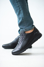Мужские кожаные кроссовки черного цвета на каждый день  8019574 фото №1