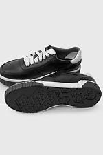 Black leather sneakers on a white platform  4205590 photo №8