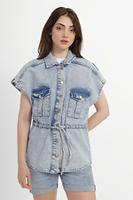 Женская джинсовая жилетка безрукавка со спущенным плечом и затяжкой на талии  4014595 фото №1