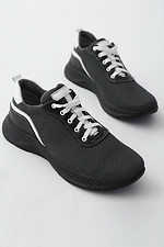 Black sports sneakers with white laces  4205600 photo №1