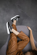 Women's black leather sneakers on a white platform  8018617 photo №11